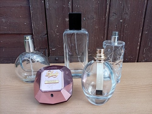 Empty perfume bottles lay - empty,