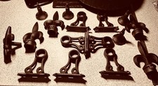 VINTAGE CAST IRON FLEUR DE LIS CURTAIN POLE FITTINGS AND TIE BACK HOOKS