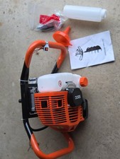 Petrol auger post hole drill