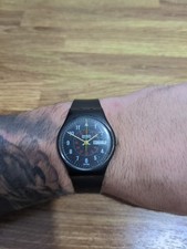 Vintage 1985 Mens Black Swatch Nicholson Aviator GB705D Watch Needs Battery 