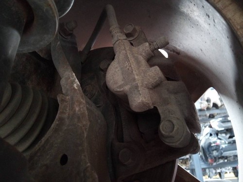 Rear left brake caliper - left,