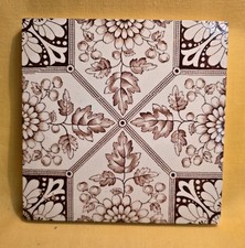 VICTORIAN GOTHIC 6 INCH BROWN COLOURED TILE. C 1890