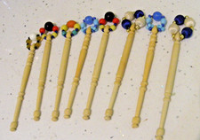 Collection of 8 vintage lace making bobbins glass & beaded tops