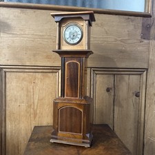 Mechanical Clock In The Form Of A Grandfather Clock