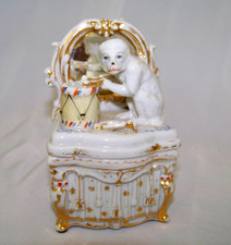 Staffordshire Monkey Playing