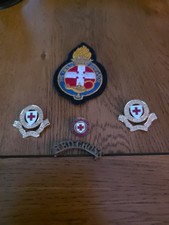 4 Red Cross Badges And A Girls