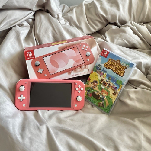 Nintendo switch lite coral - nintendo,