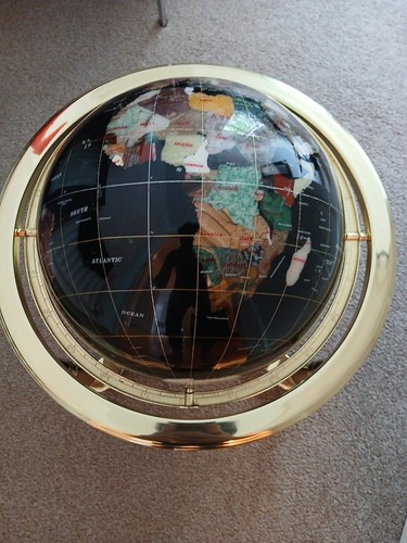 Rotating gemstone globe - globe, on