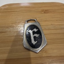 FIRESTONE TYRES RARE CAR KEY FOB VINTAGE BADGE  BLACK ENAMEL MADE IN ENGLAND