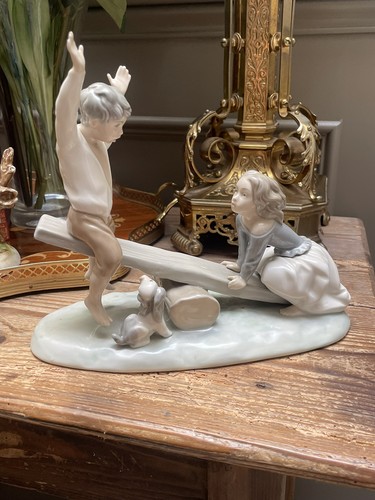 Lladro seesaw boy girl dog - lladro, boy,