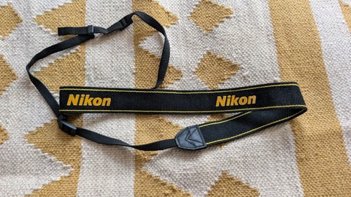 Nikon camera neck shoulder - camera,
