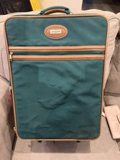 vintage green Jaguar luggage