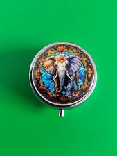 METAL PILL BOX FEATURING