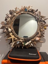 driftwood round mirror. seaglass and shells.