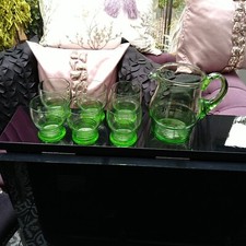 A Vintage Seven Piece Green Glass Lemonade Set