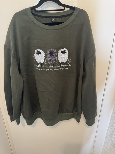 Green sweatshirt with sheep - green,