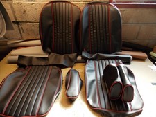 Mgb vinyl SEAT COVERS black with RED pipings . Plain fluted centres 1970 to 1981