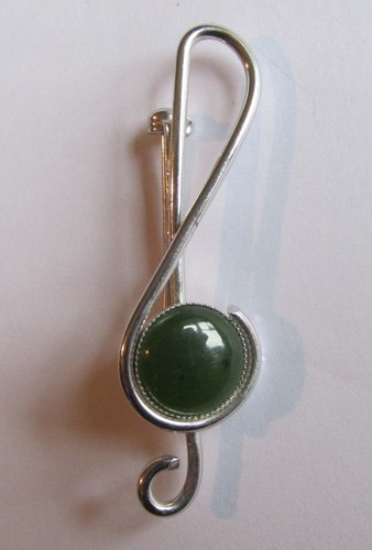 Silver brooch with - with, stone