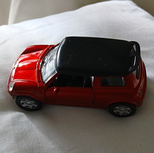 Red black diecast model car - &,