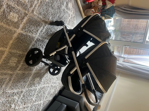 Grey double buggy travel - a,