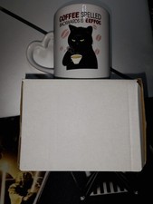 Cat-Themed Novelty Mug.