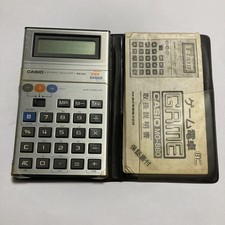 CASIO MG-880 Retro Electronic Calculator with Game Function and Manual