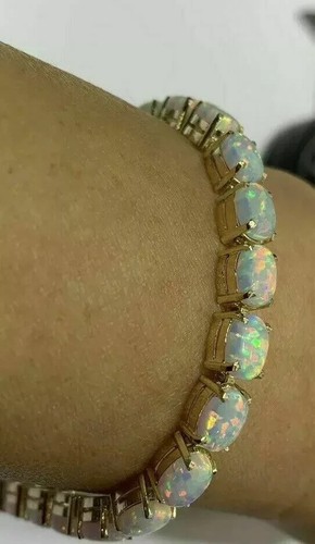Oval cut fire opal 7 - cut, 7.5