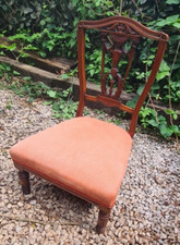 Upholstered nursing chair with carved backrest. Good condition. Can deliver.