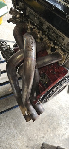 Simpson race manifold - simpson, xe