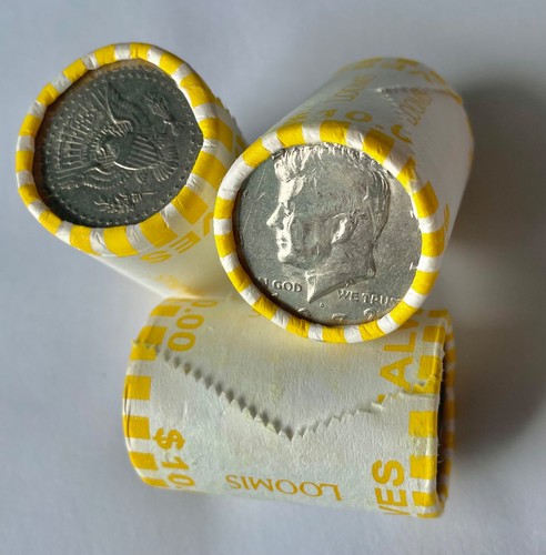 One kennedy half dollar - (1),