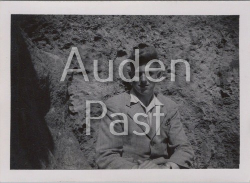 1952 young man seated - young,