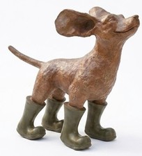 Dog Ornament In Wind Garden