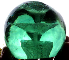 VICTORIAN HEAVY GLASS DUMP PAPERWEIGHT.Approx just under 3 1/2" inches wide.