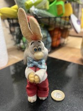 Very Old Roger Rabbit Pinch Just Below His Shoulders & His Arms Open To Grab