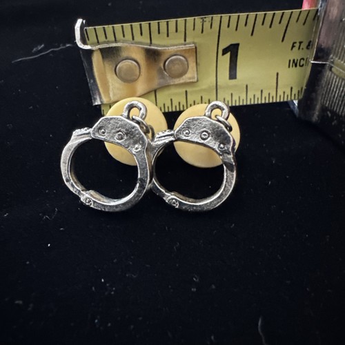 Handcuffs tie tac - tac, tack