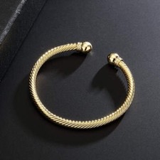 Gold twisted torque bangle - twisted,