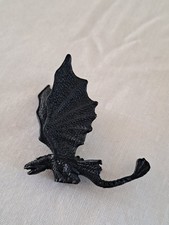 Toothless, the Night Fury dragon from the How to Train Your Dragon Tiny Figure