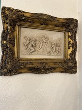 late 19th-century reconstituted marble wall plaque depicting relief of cherubs