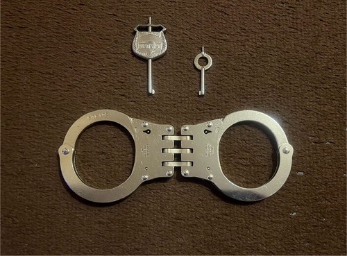 Hiatt hinged handcuffs model - hiatt,