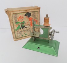 OLD BOXED MINIATURE TINPLATE SEWING MACHINE