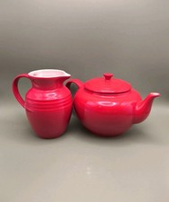 Red Le Creuset Teapot And Milk