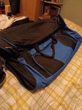 2 X Extra Large Hold Alls On Wheels With Front Pocket And 2 Side Pockets