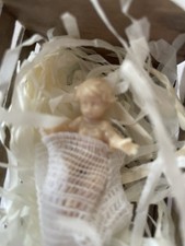 TINY BABY JESUS FIGURE LAYING