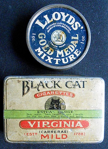 Two tobacco tins - two,