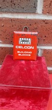VINTAGE CELCON BUILDING BLOCK  ADVERTISING METAL CLIP