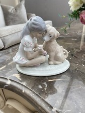 GIRL AND DOG FIGURINE -