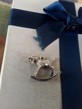 SILVER CHARM ROCKING HORSE