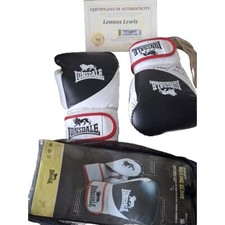 "LENNOX LEWIS" SIGNED ,FULL SIZED PAIR OF BOXING GLOVES.  ONE SIGNED .WITH COA