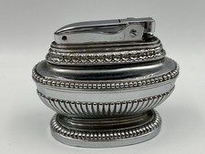 Vintage silver plate table lighter.