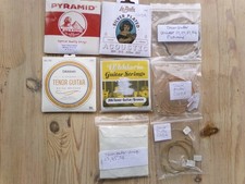 Job lot of tenor guitar strings, some used, some new - FREE POSTAGE.